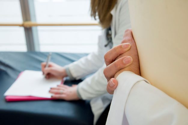 Doctor's hands with chart HMC