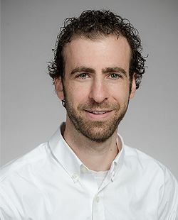 Jacob Berman headshot in a white shirt